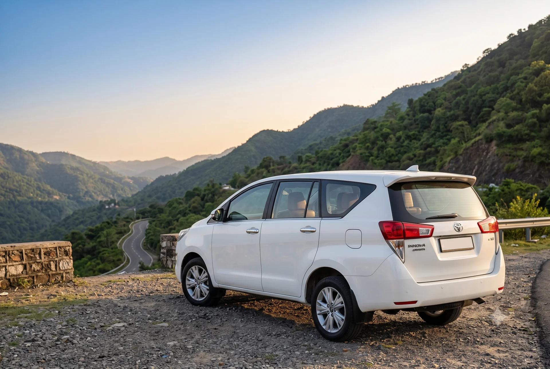 Illustrative white Toyota Innova overlooking a mountain road near Kalka